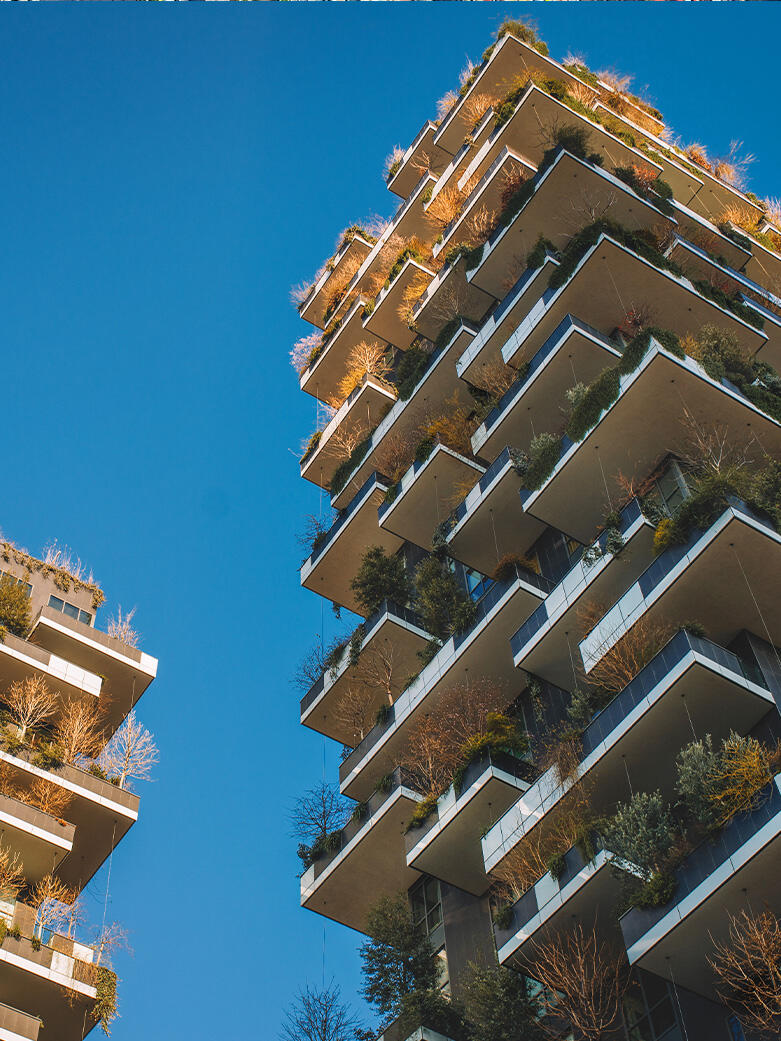 Contemporary residential development with landscaped balconies, representing new development projects